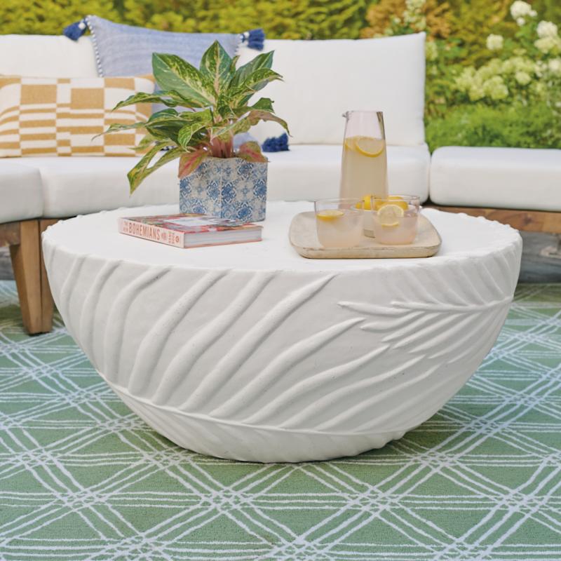 modern outdoor living space with Soleil coffee table and sofa seating